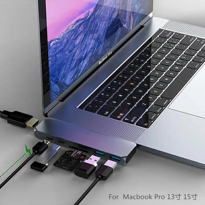Dual Type-C seven-in-one hub in aluminium-magnesium alloy with HDMI and USB ports, 12.7cm long