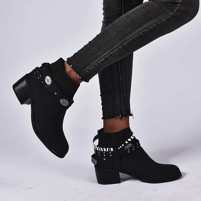 Vintage women's black high heel shoes with tassel detail and back-tie fastening