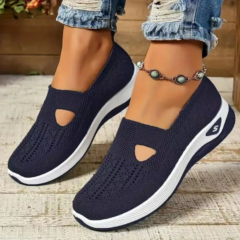 Women's low-top casual mesh shoes with a T-strap, round toe, and soft PVC sole in various solid colours.