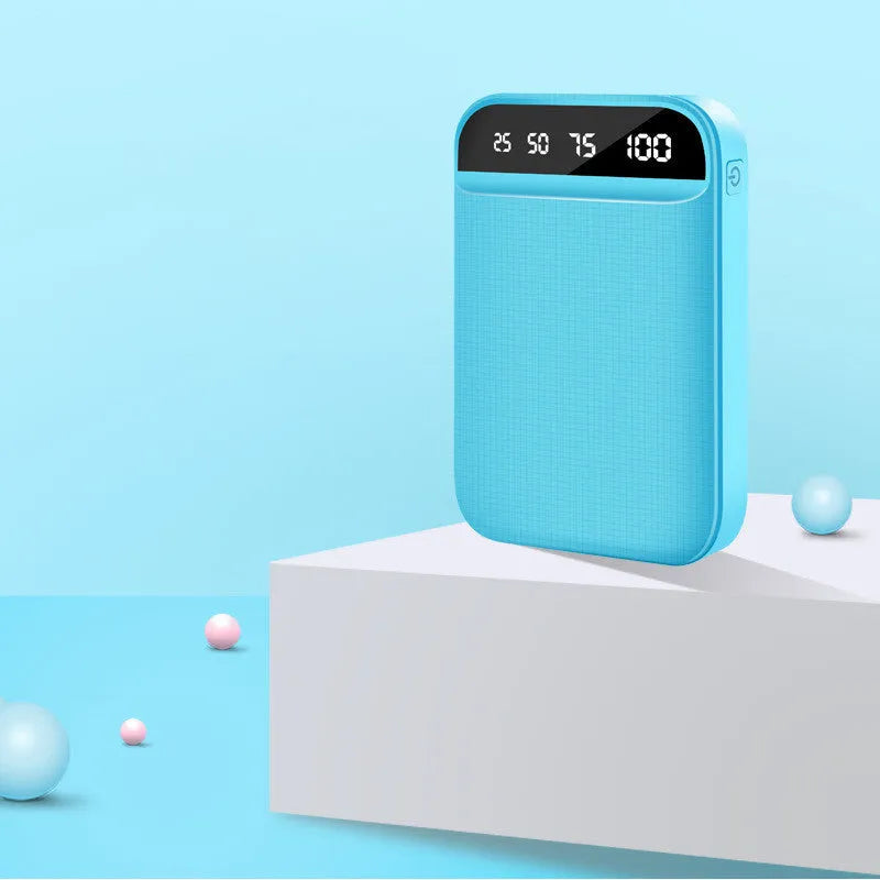 Compact rectangular power bank in multiple colours showing USB ports on side.