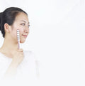 Beauty rod roller massager made from aluminium alloy and niobium, size 19 mm by 193 mm