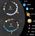 Two natural stone bead bracelets with zodiac charms on a slate background, showing adjustable clasp.