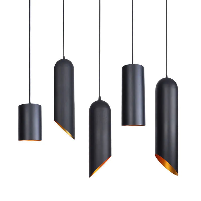 Retro black iron chandelier with multiple light arms hanging from a ceiling