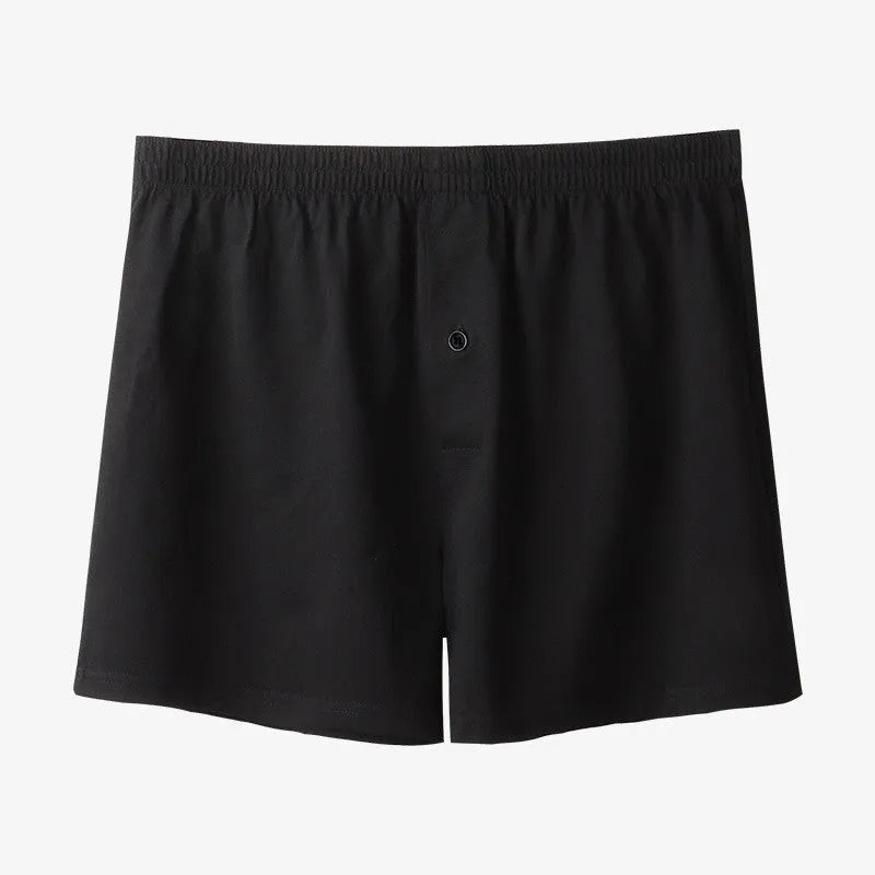 Men's loose fit high waist boxer shorts in pure cotton, shown in light grey, dark blue, and black colours.