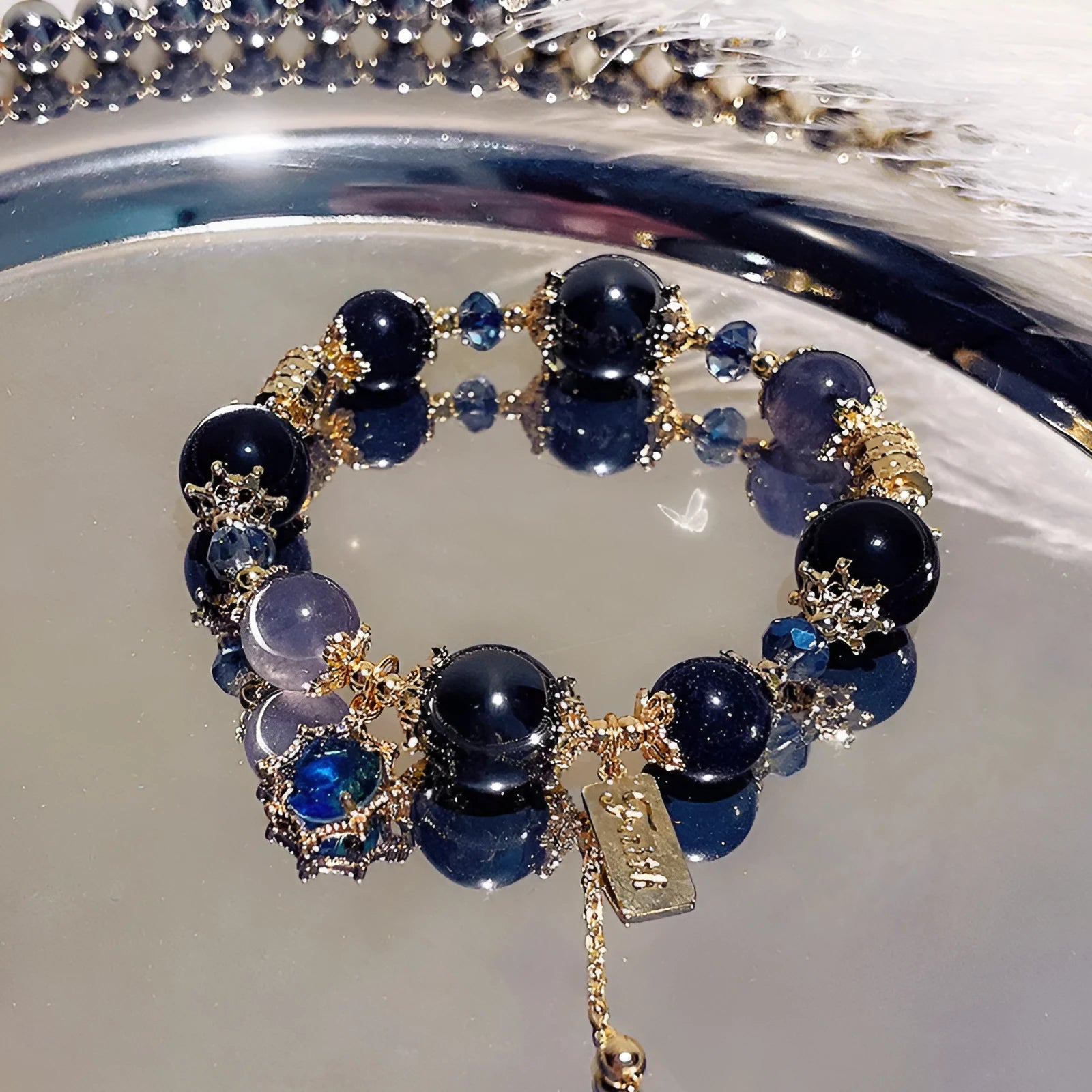 Women's galaxy-coloured alloy bracelet with bow and snowflake pendant charm