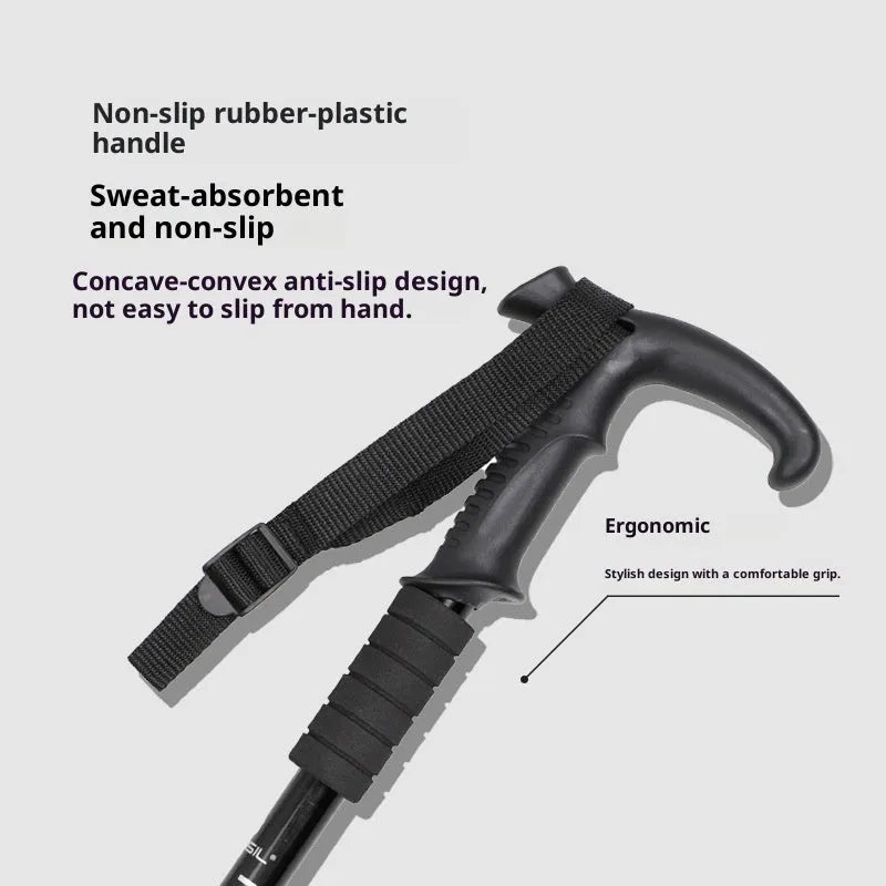 Silver four-section aluminium alloy alpenstock with curved handle, extended to full height on outdoor trail