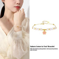 Pink S925 silver bracelet with gradient epoxy cherry blossom pendant and Hetian jade beads