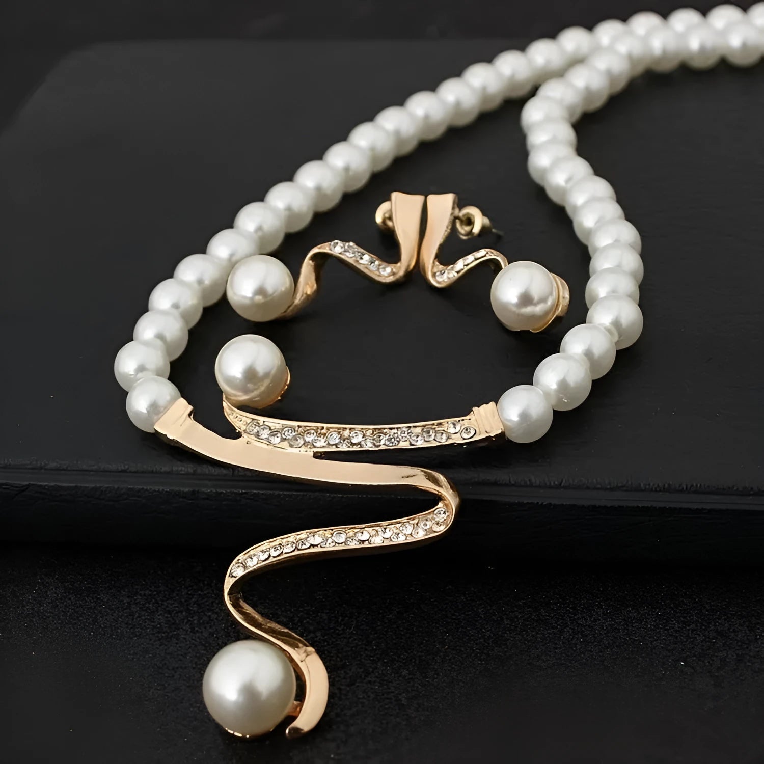 Gold electroplated pearl necklace and earrings set with deep V clavicle design