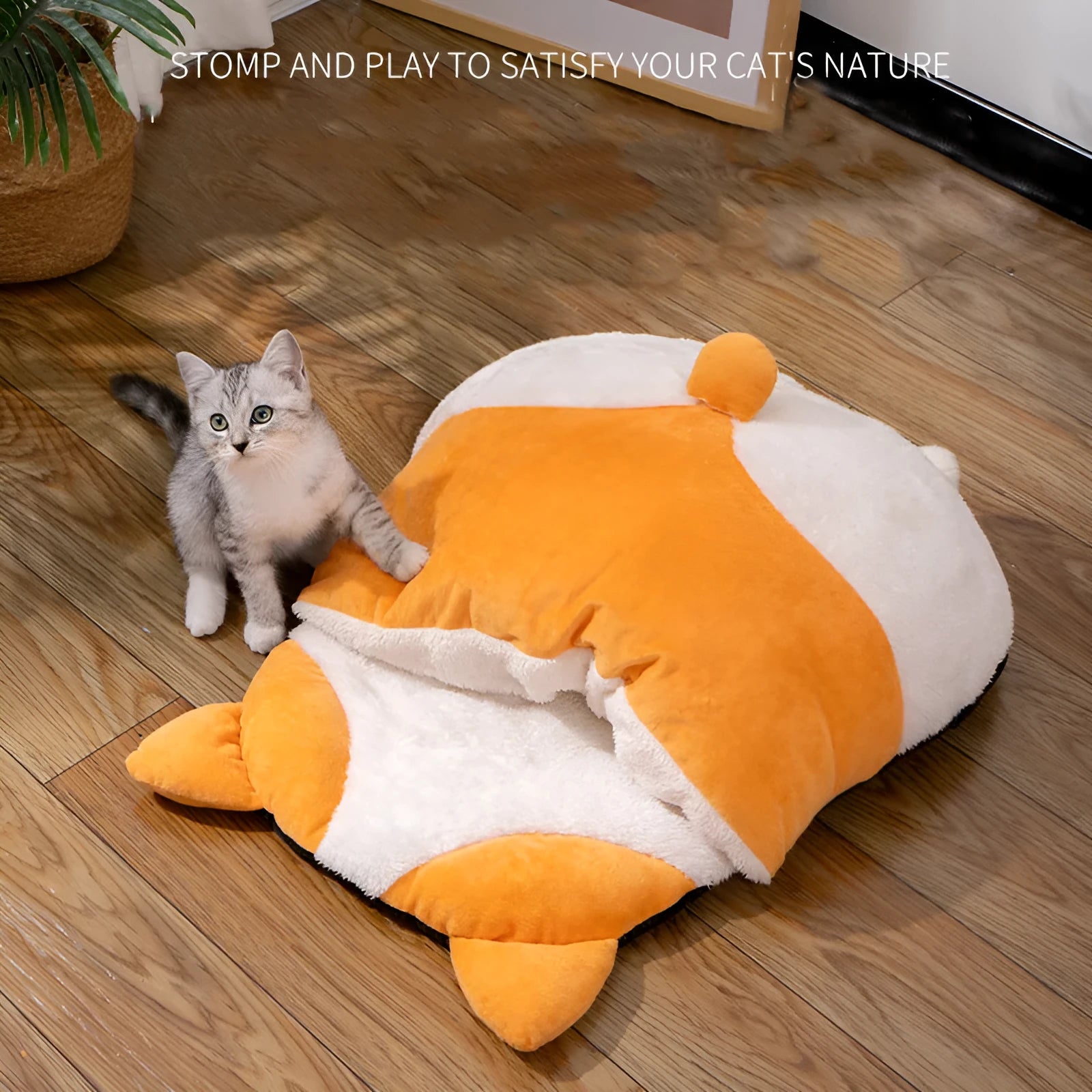 Orange semi-closed cat sleeping bag bed measuring 65 cm by 53 cm
