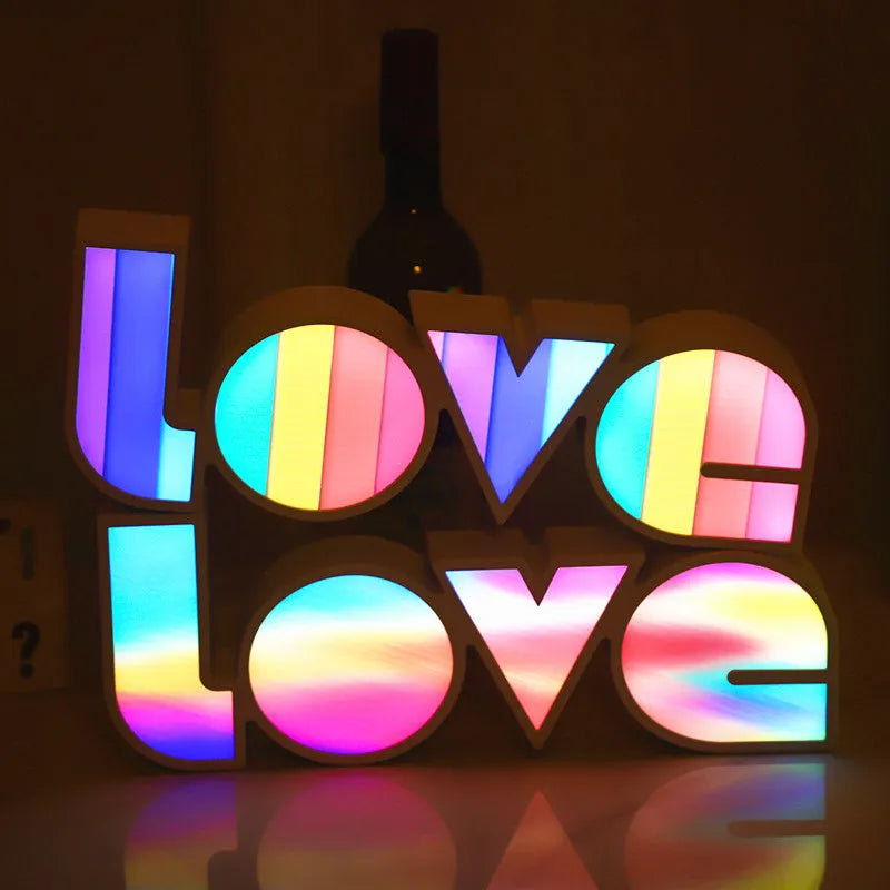 LED LOVE light decoration with rainbow-style lampshade showing romantic room illumination