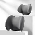 Grey geometric-patterned memory foam car headrest pillow and lumbar support pillow on a car seat.