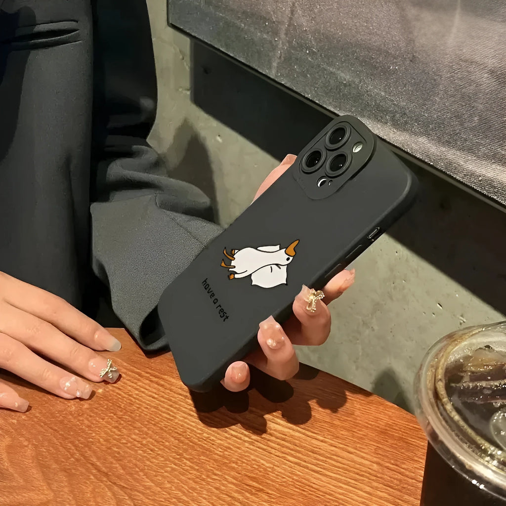 Cartoon duck design silicone iPhone case in black, white, or blue colour