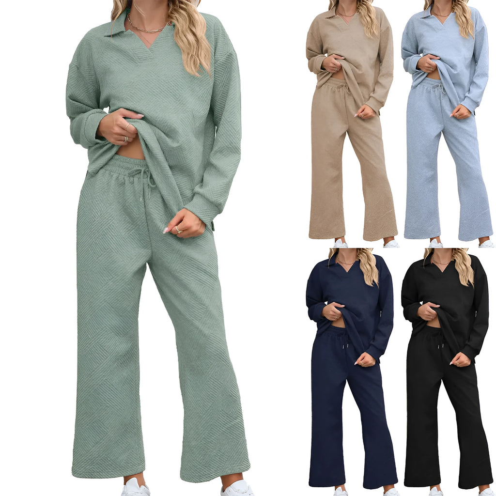 Women's solid colour knitted lapel sweater and cropped pants suit set on a hanger.