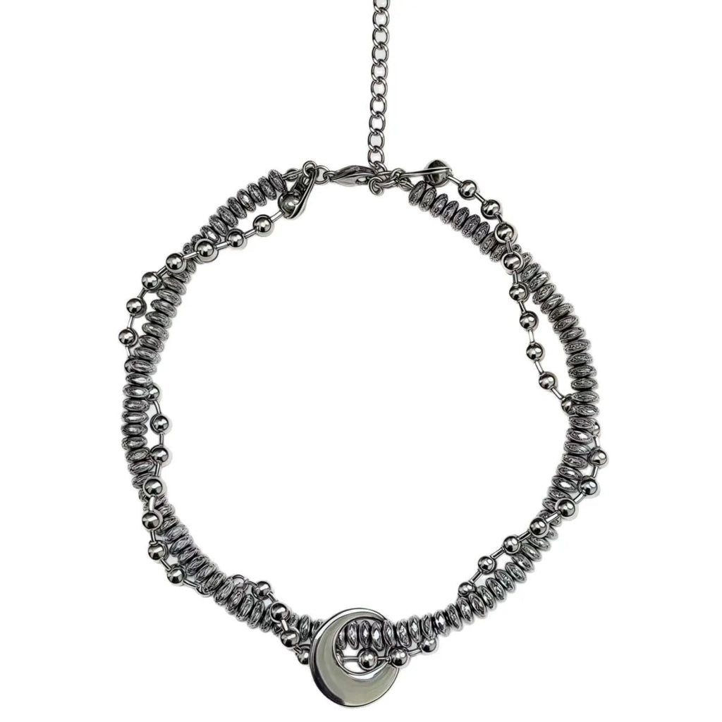 Silvery hand-woven titanium steel hip hop necklace with winding heavy industry chain texture on white background