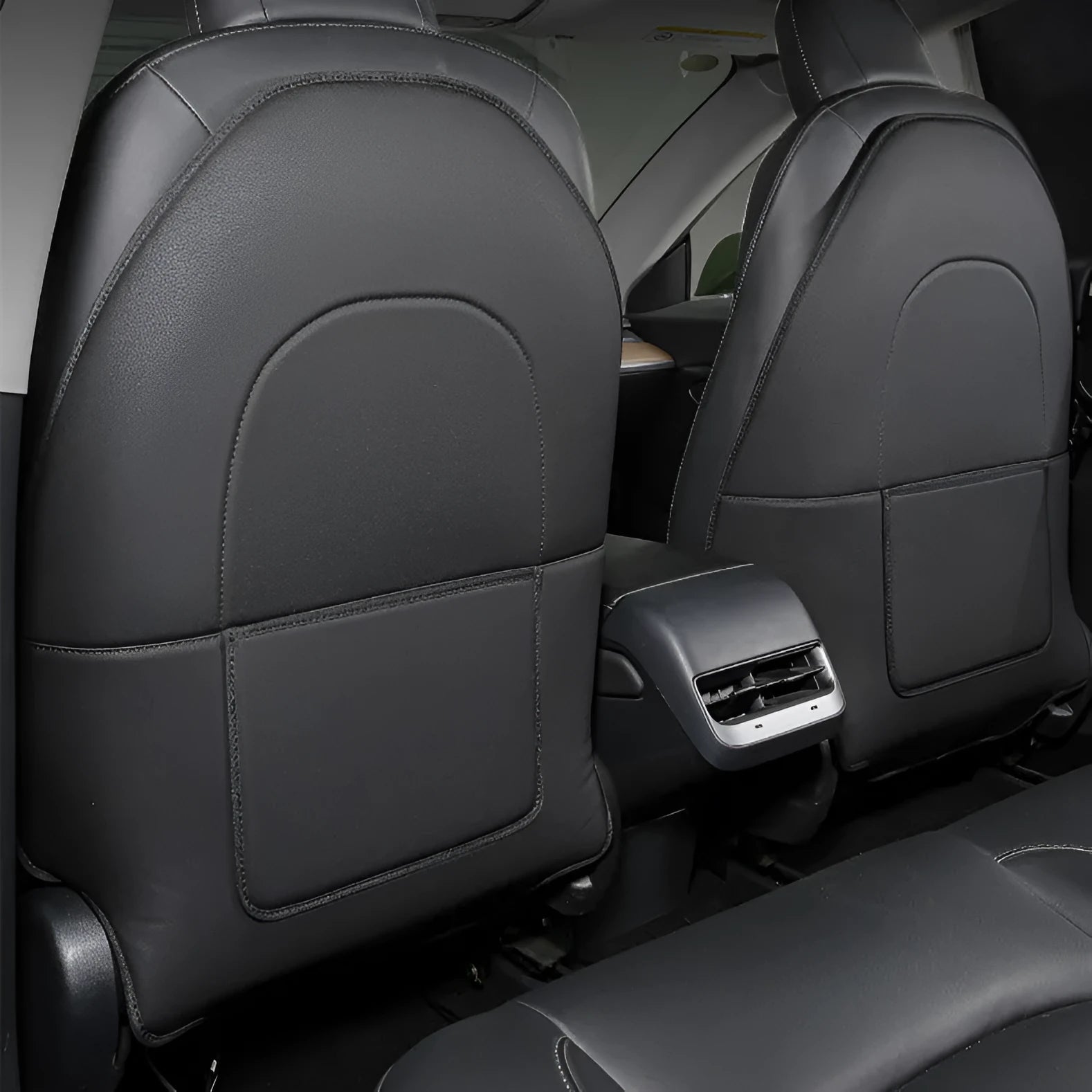 Black leather rear anti kick pad car seat protector measuring 68cm by 42cm