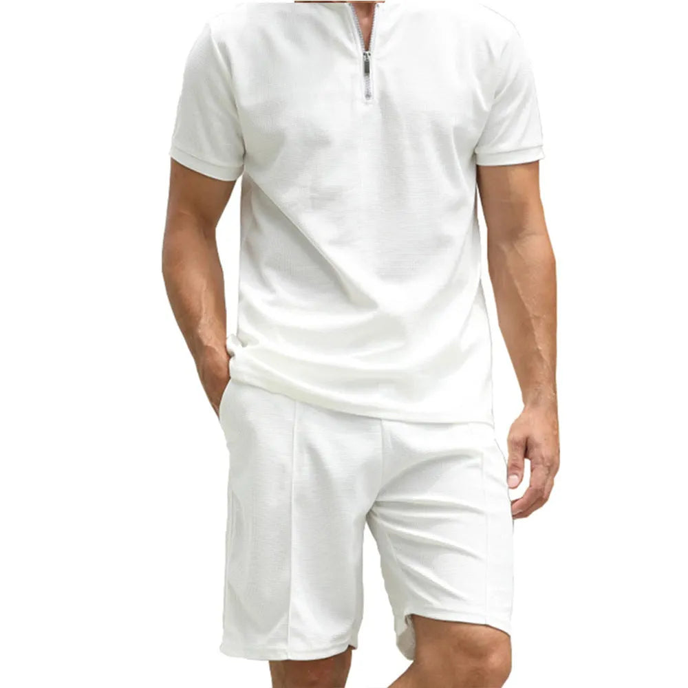 Men's solid colour polo shirt and trouser two-piece suit set in beaded bird's eye polyester fabric.