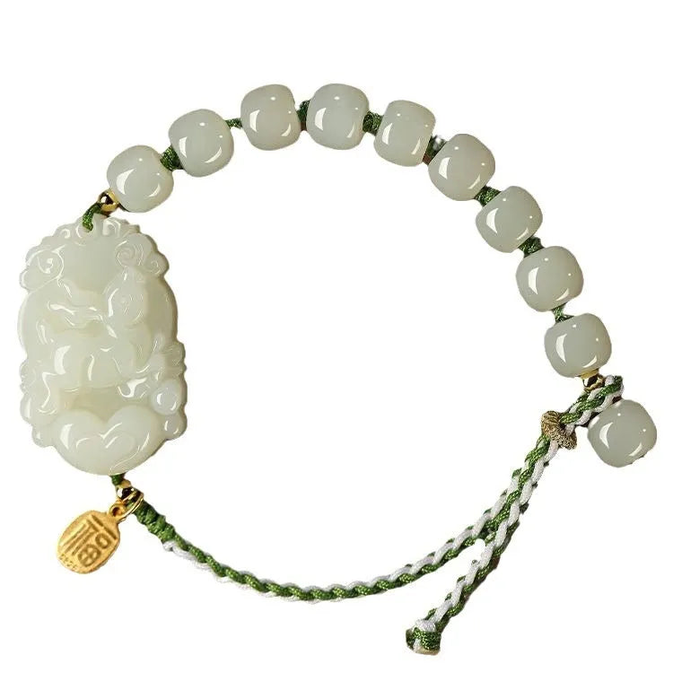 Hetian jade and S925 silver Chinese zodiac bracelet on a red rope for the Year of the Rabbit