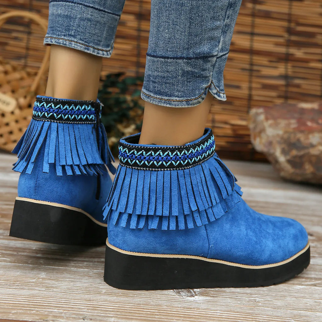 Women's suede wedge ankle boots in dark brown with a side zipper and thick rubber sole.
