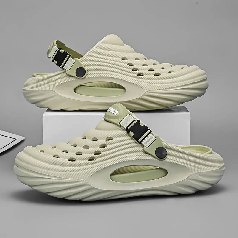 Men's solid colour EVA platform slippers with hollow-out design in black, shown from the side.