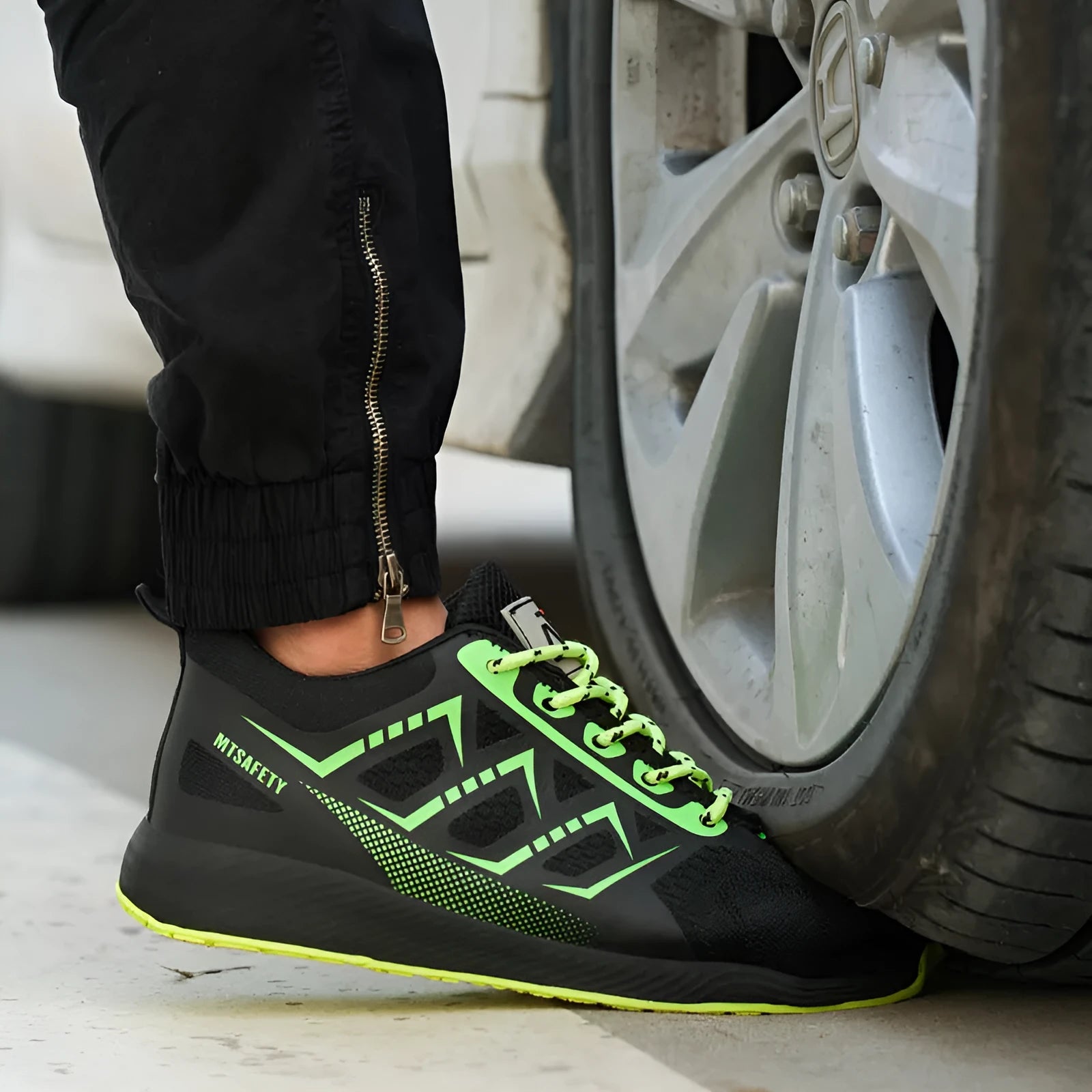 Black ultra-light labour protection shoes with steel toe caps and front lace-up design