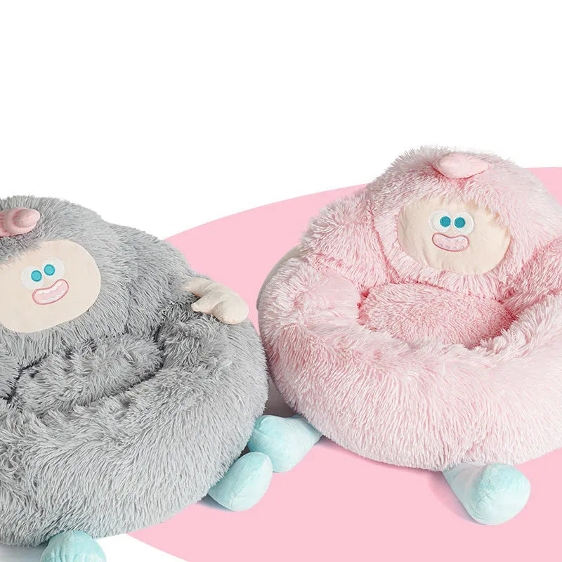Grey plush pet nest bed with 40cm high sides shown with small dog curled inside