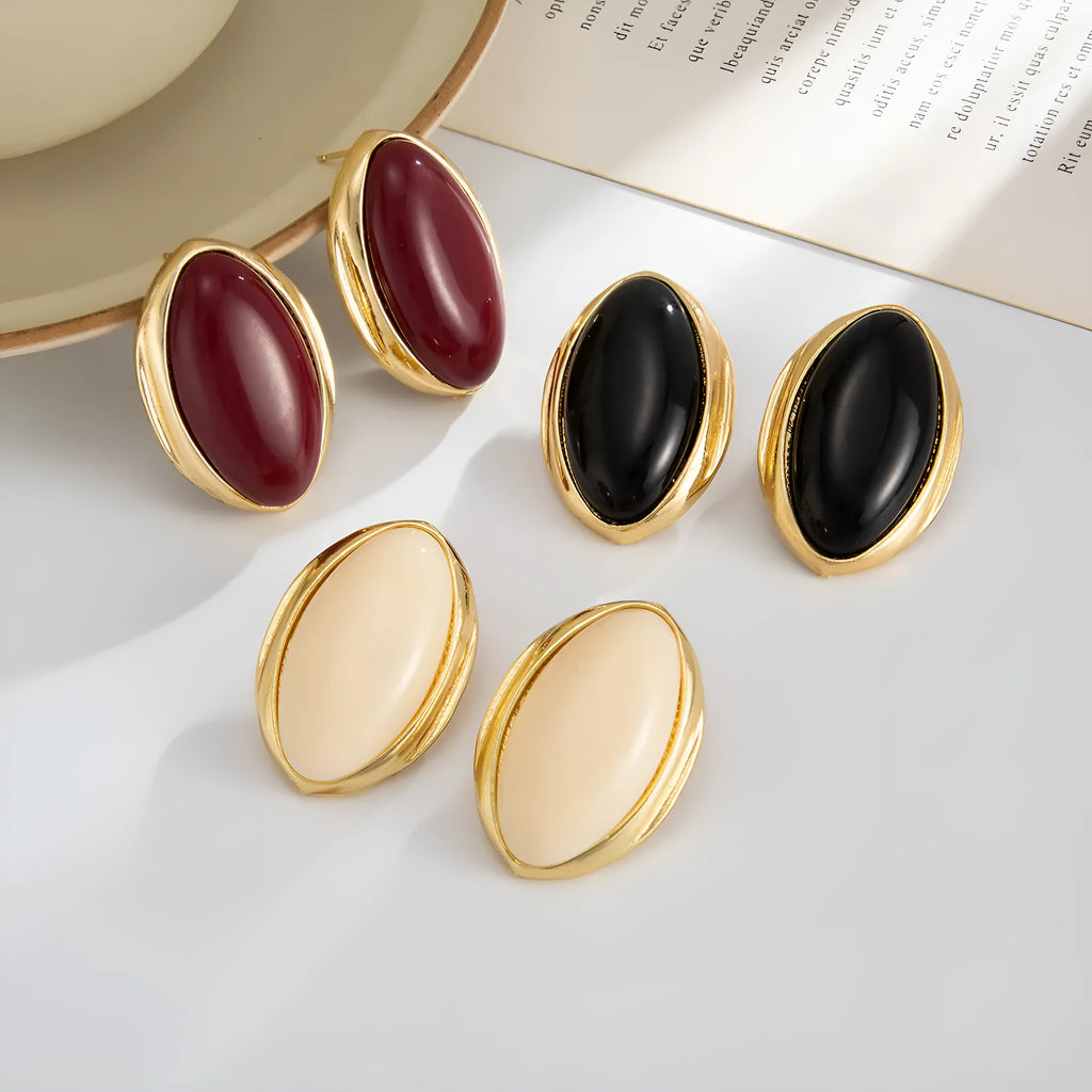 French retro court oval gemstone earrings in electroplated gold with alloy and resin construction