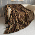 Leopard print artificial wool blanket in brown gradient, polyester fibre, available in multiple sizes