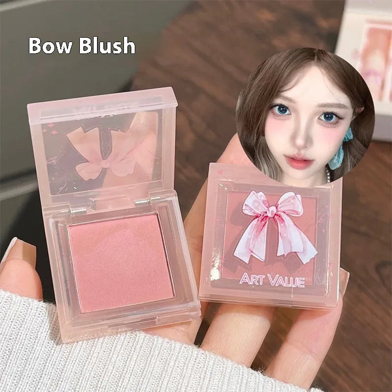 Butterfly Box makeup set with four matte lip muds, powder blusher compact, and necklace.