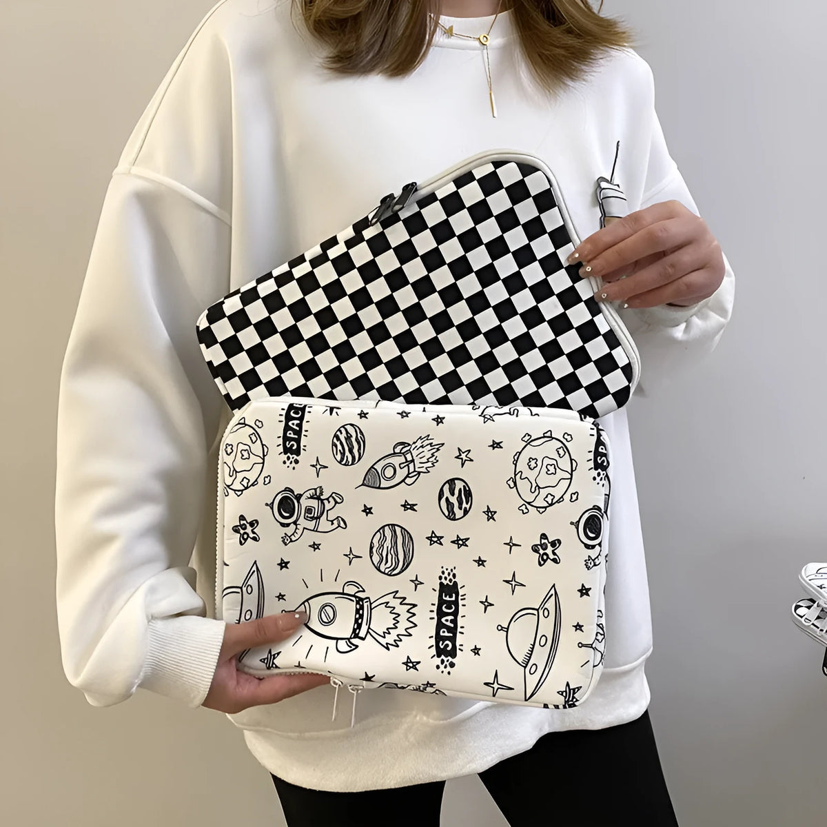 Checkerboard polyester hand file bag in plaid or space, 11-inch or 14-inch laptop sleeve.