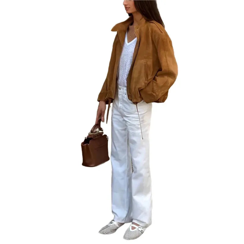 Retro solid colour loose-fit long sleeve jacket on a hanger.