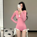 Women's long sleeve one-piece swimsuit in pink and black colour options