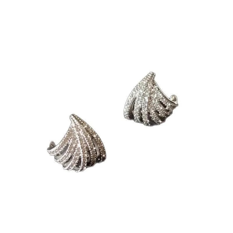 A pair of geometric zircon earrings with a line design and platinum electroplated finish.