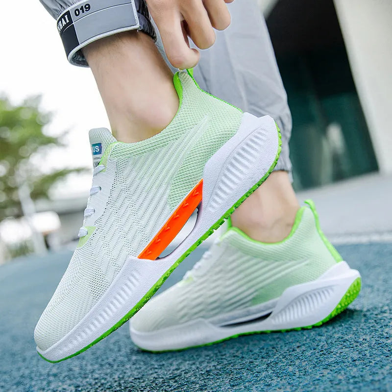Men's blue casual sports shoes with mesh upper and plastic sole, shown with grey and green colour options.