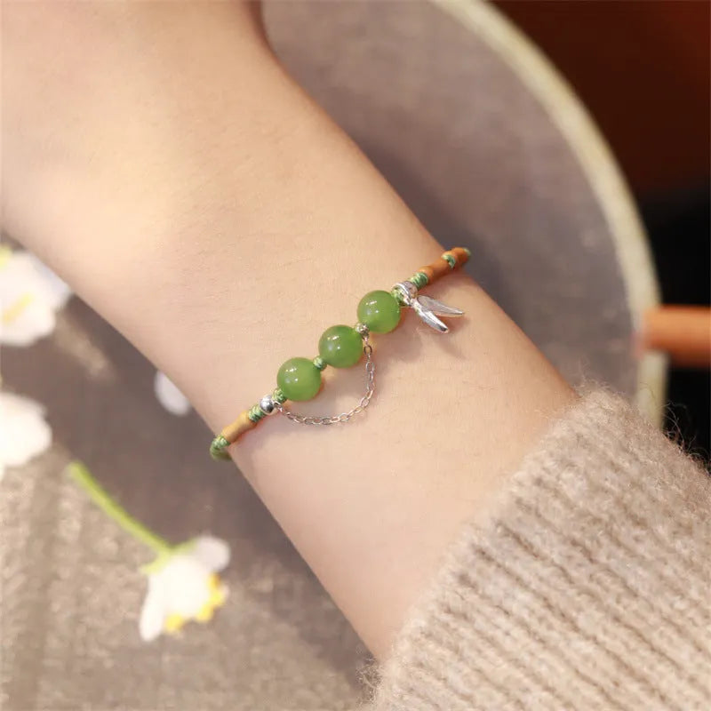 Handmade woven Hetian jade bracelet with diamond shape and lotus seedpod design in light green or blue chalcedony