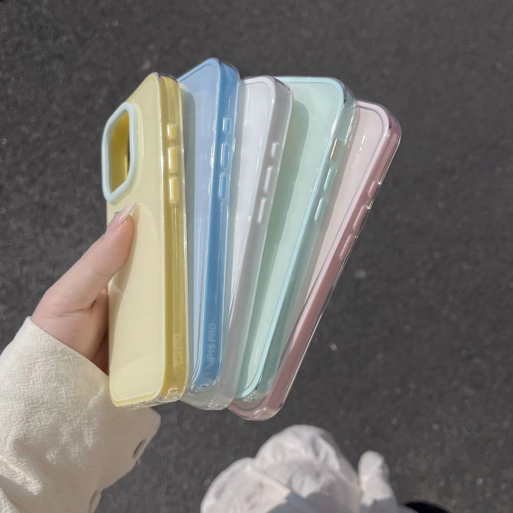 Solid colour transparent TPU jelly phone case for iPhone showing yellow, white, blue, pink, and green options