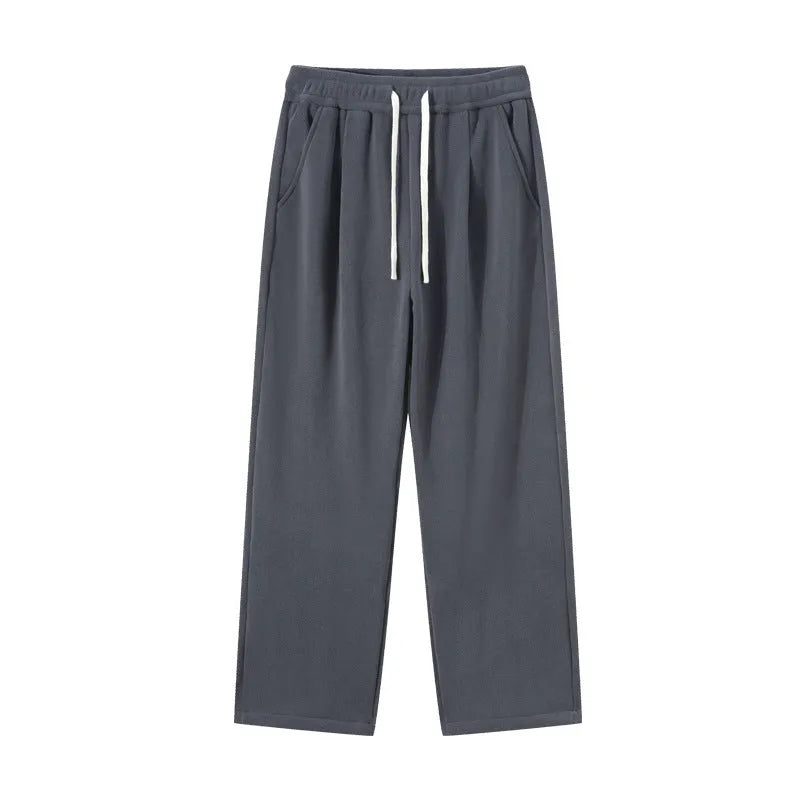 Men's apricot coloured double-sided polar fleece casual trousers with a loose fit and drawstring waist.