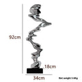 Abstract resin ornament in modern style with metallic finish for hallway or living room decoration