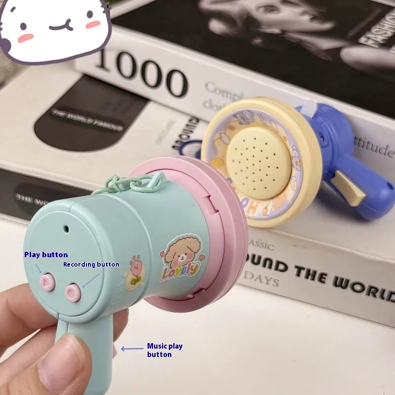Green and yellow plastic cartoon horn keychain ornament with cute style design