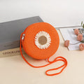 Woven straw raffia crossbody bag in beige colour, showing phone-sized dimensions and strap.