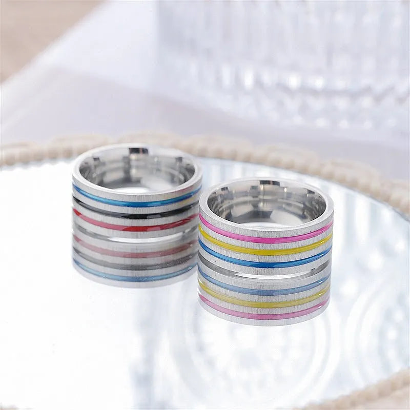 Titanium steel ring with rainbow drops of oil finish, flower shape, 8mm width, silver colour