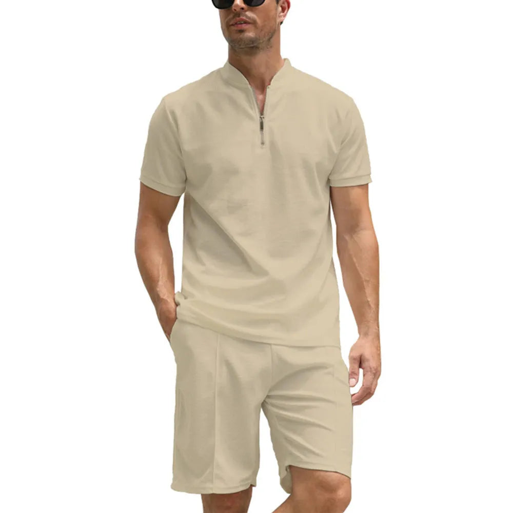 Men's solid colour polo shirt and trouser two-piece suit set in beaded bird's eye polyester fabric.