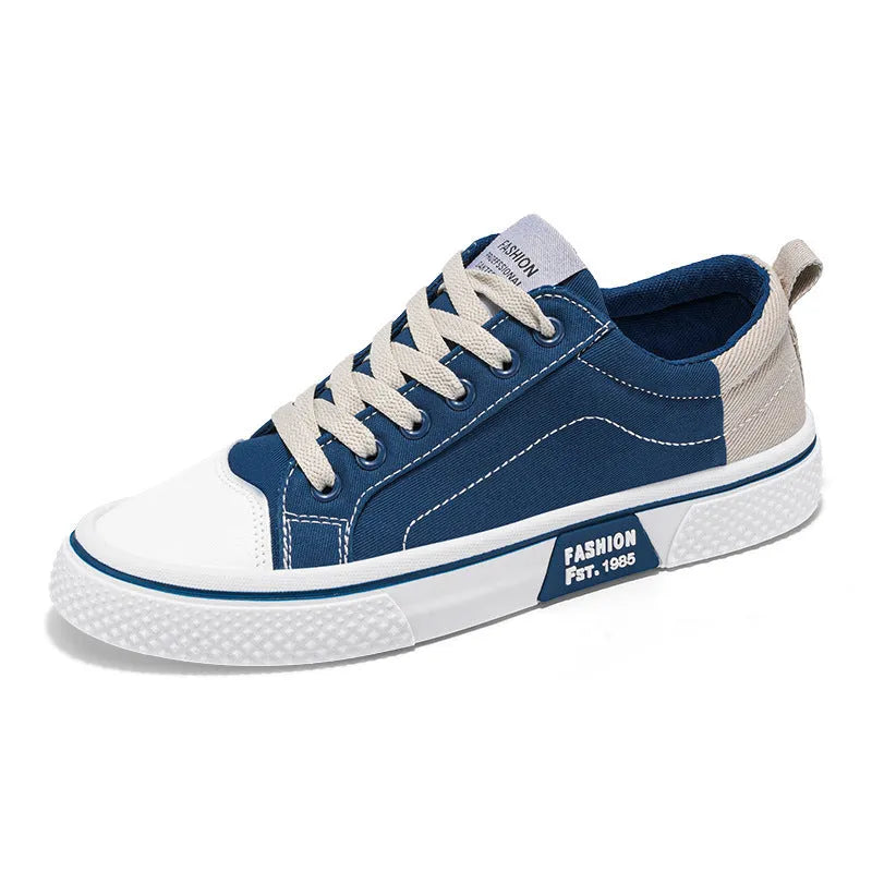 Men's low-top casual canvas shoes in blue with round toe and lace-up front for skateboarding