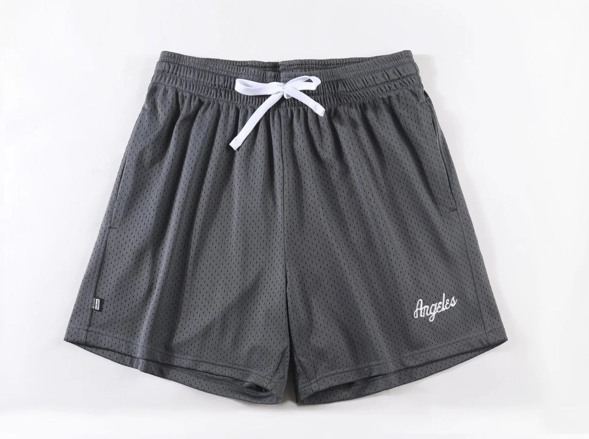 Men's black double-layer mesh sports shorts on a white background