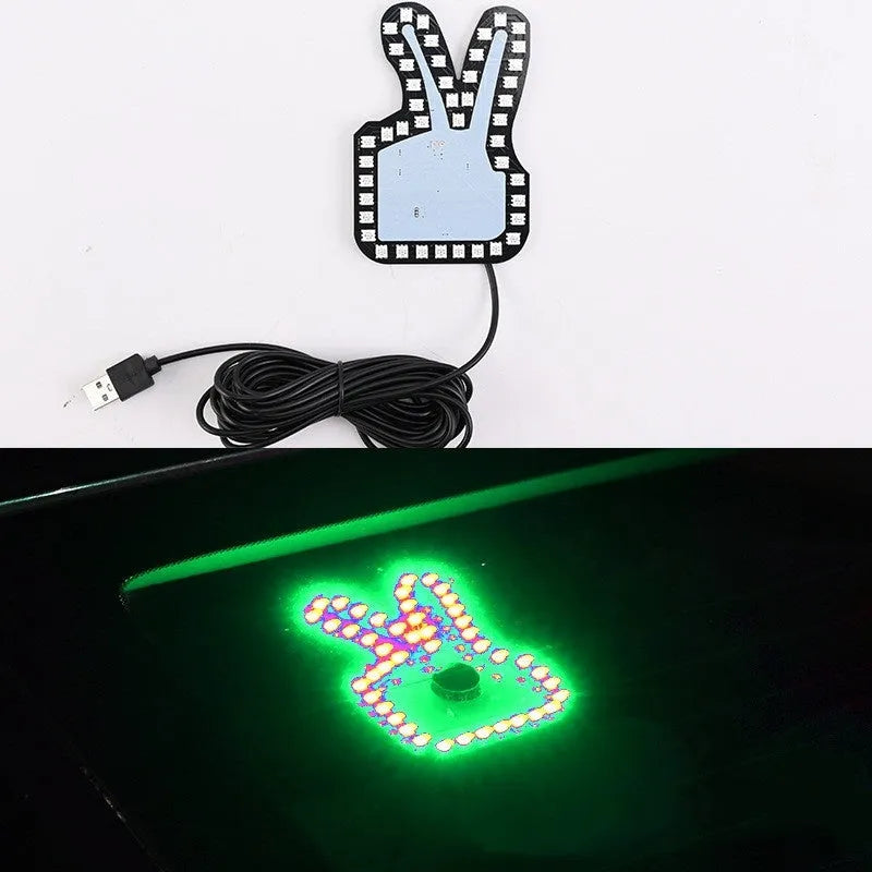 Car USB finger gesture lights showing thumbs-up, OK sign, and scissor hand illuminated designs