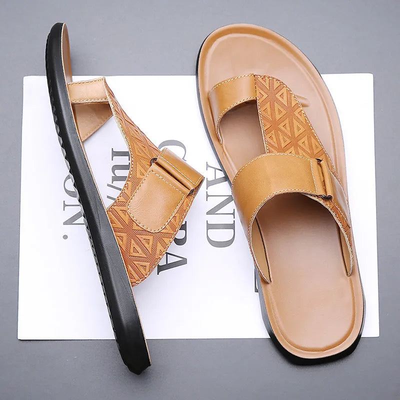 Men's white open-toe cowhide leather slippers with a rubber sole on a casual background