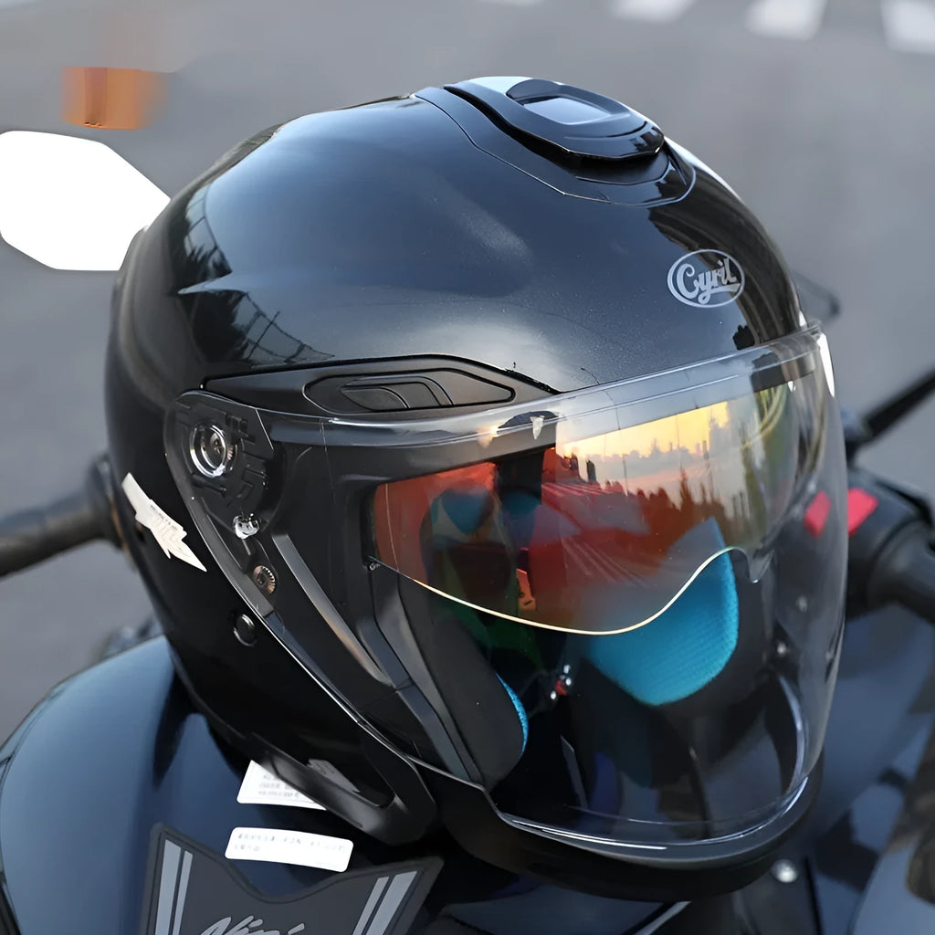 Summer motorcycle half helmet with double visor in matte black finish on light background