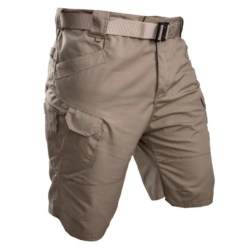 IX7 men's tactical shorts in cotton blend fabric, shown in a camouflage colour with button-fly closure.