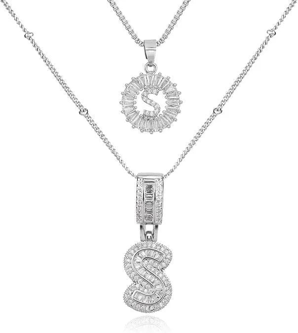 26 English letters copper-plated gold diamond initial pendant necklace with adjustable chain on display