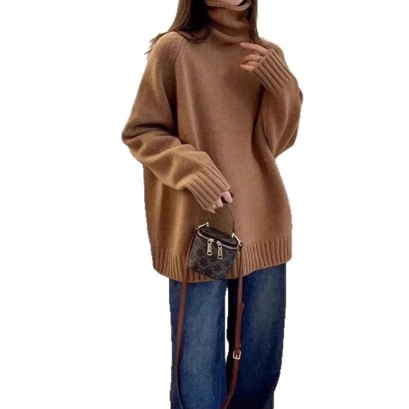 Women's loose grey turtleneck sweater with a thick curling pile collar and 3D pattern texture.