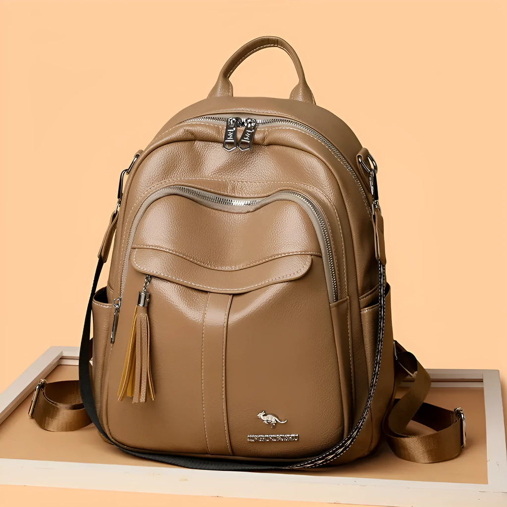 Genuine leather hand-held tassel backpack in khaki with stitching and fringe detail